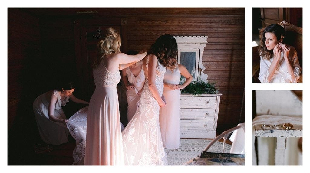 Bridesmaids helping bride do up lace wedding gown before wedding - kathy beaver photography
