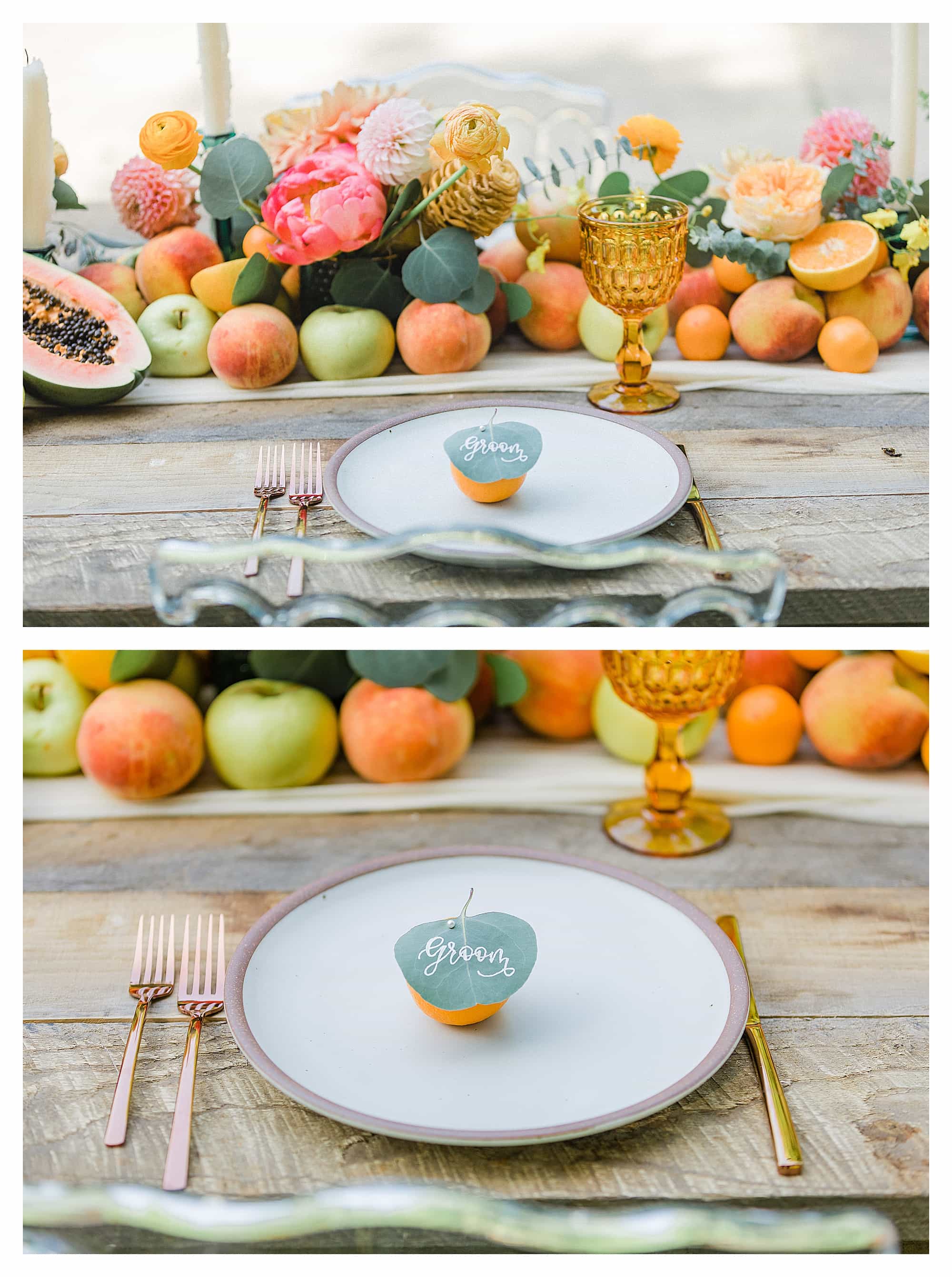 small orange with leaf pinned in it for place cards sitting on white place