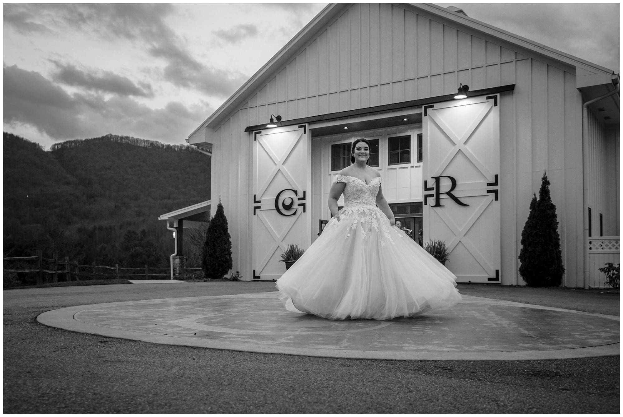 bride in front of barn doors at wedding venue