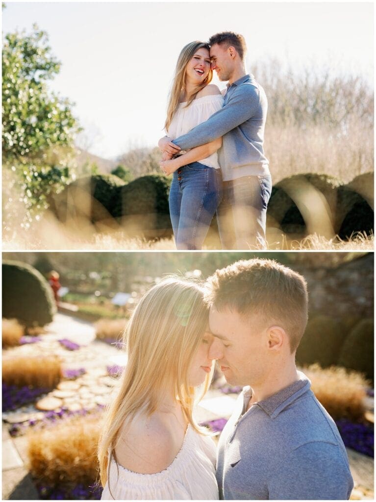 Could laughing and close to one another with sun flares and foreground of plants in the image.