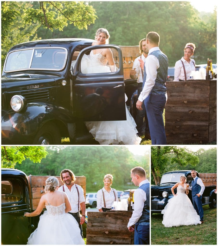 The bride and groom get drinks together at a beer truck that serves beer on tap at their wedding in Asheville.