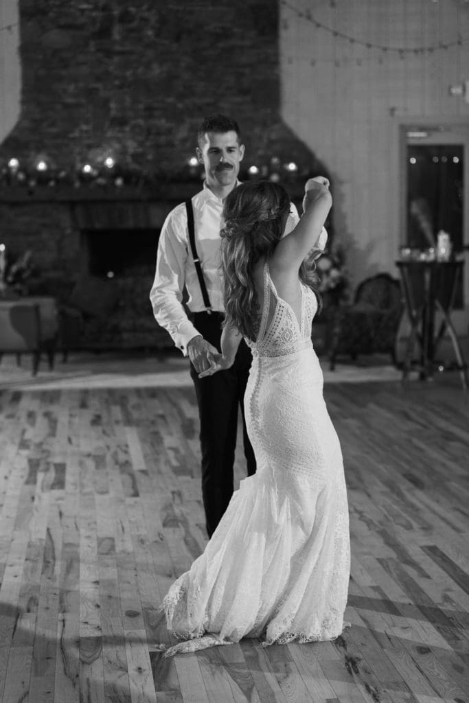 Black and white photo of the bride and groom dancing | Kathy Beaver Photography | Asheville Wedding Photographer
