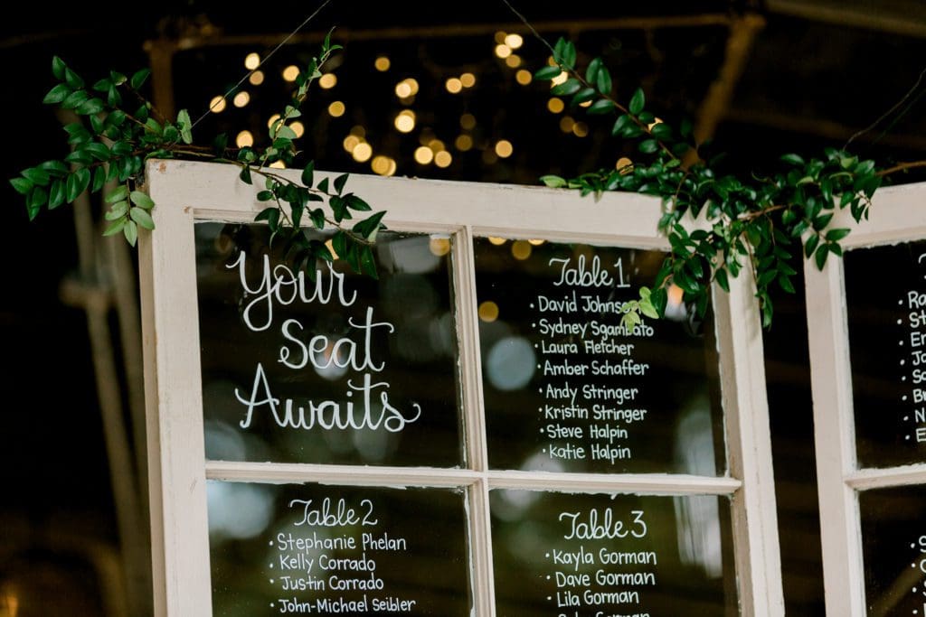 A seating chart made with window frames | Kathy Beaver Photography | Asheville Wedding Photographer