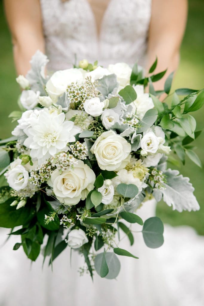 The bride shows off her white and green bridal bouquet | Kathy Beaver Photography | Asheville Wedding Photographer