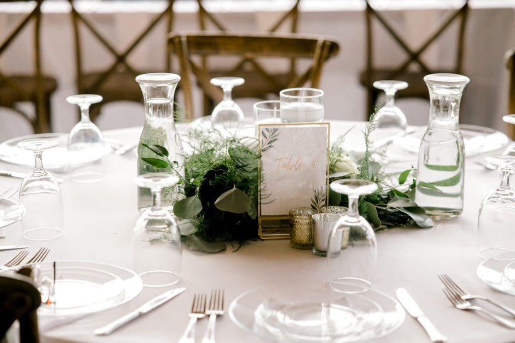 Table decorations with greenery and candles | Kathy Beaver Photography | Asheville Wedding Photographer