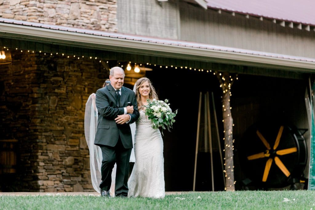 The bride walks down the aisle with her father | Kathy Beaver Photography | Asheville Wedding Photographer