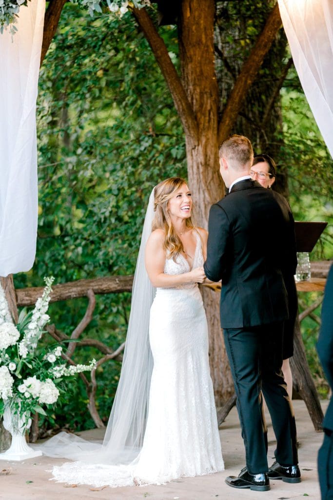 The bride smiles during their vows | Kathy Beaver Photography | Asheville Wedding Photographer