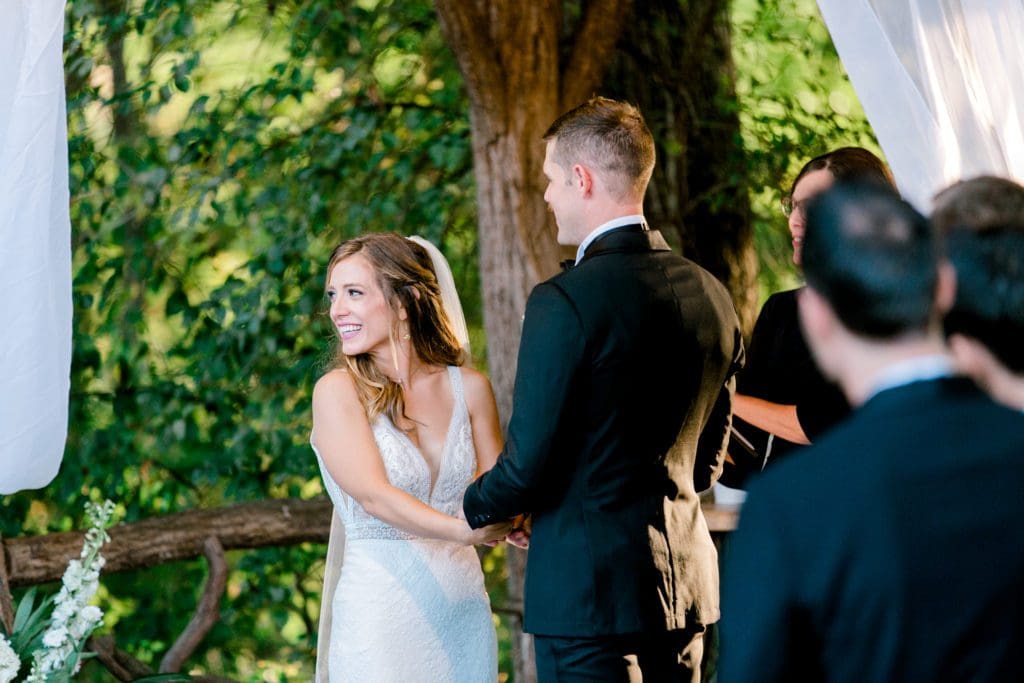 The bride smiles out at her guests | Kathy Beaver Photography | Asheville Wedding Photographer