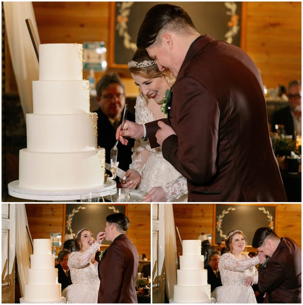 The bride and groom cut their wedding cake together and feed a piece to one another  | Asheville Wedding Photographer