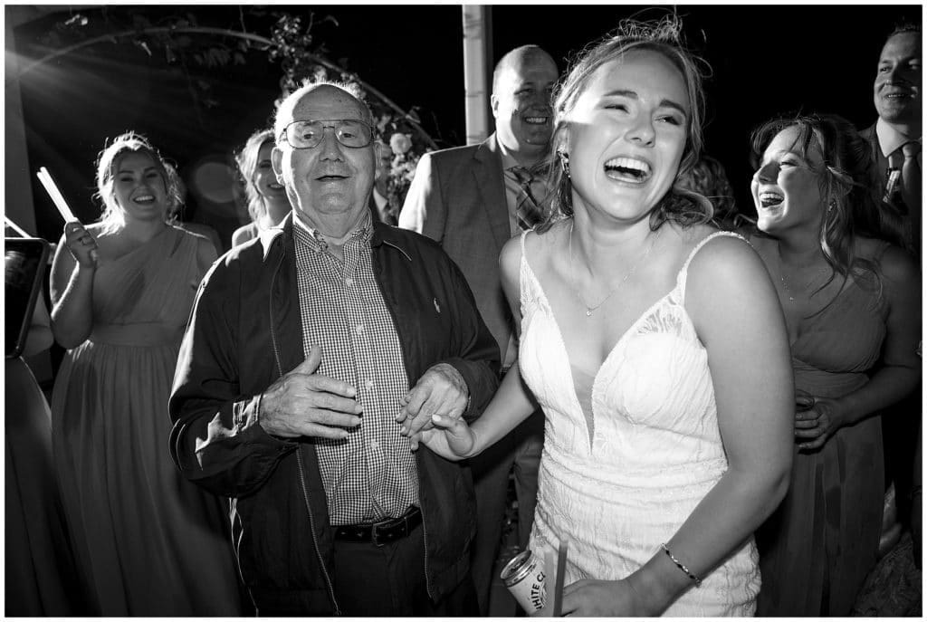 bride dancing with grandfather at reception