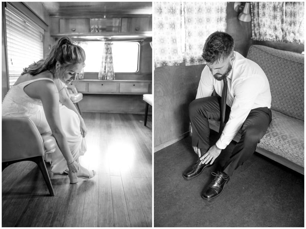 bride and groom putting shoes on in camper at Junebug Retro.