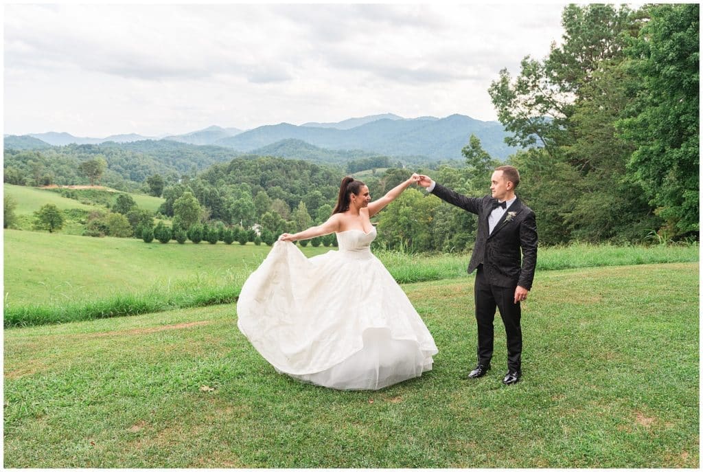 groom dancing with bride at the Ridge overlook