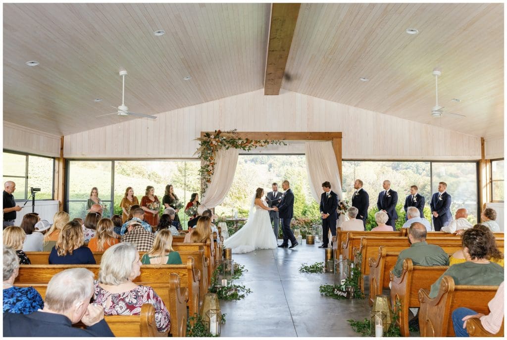 Couple saying their vows at their Chestnut Ridge wedding