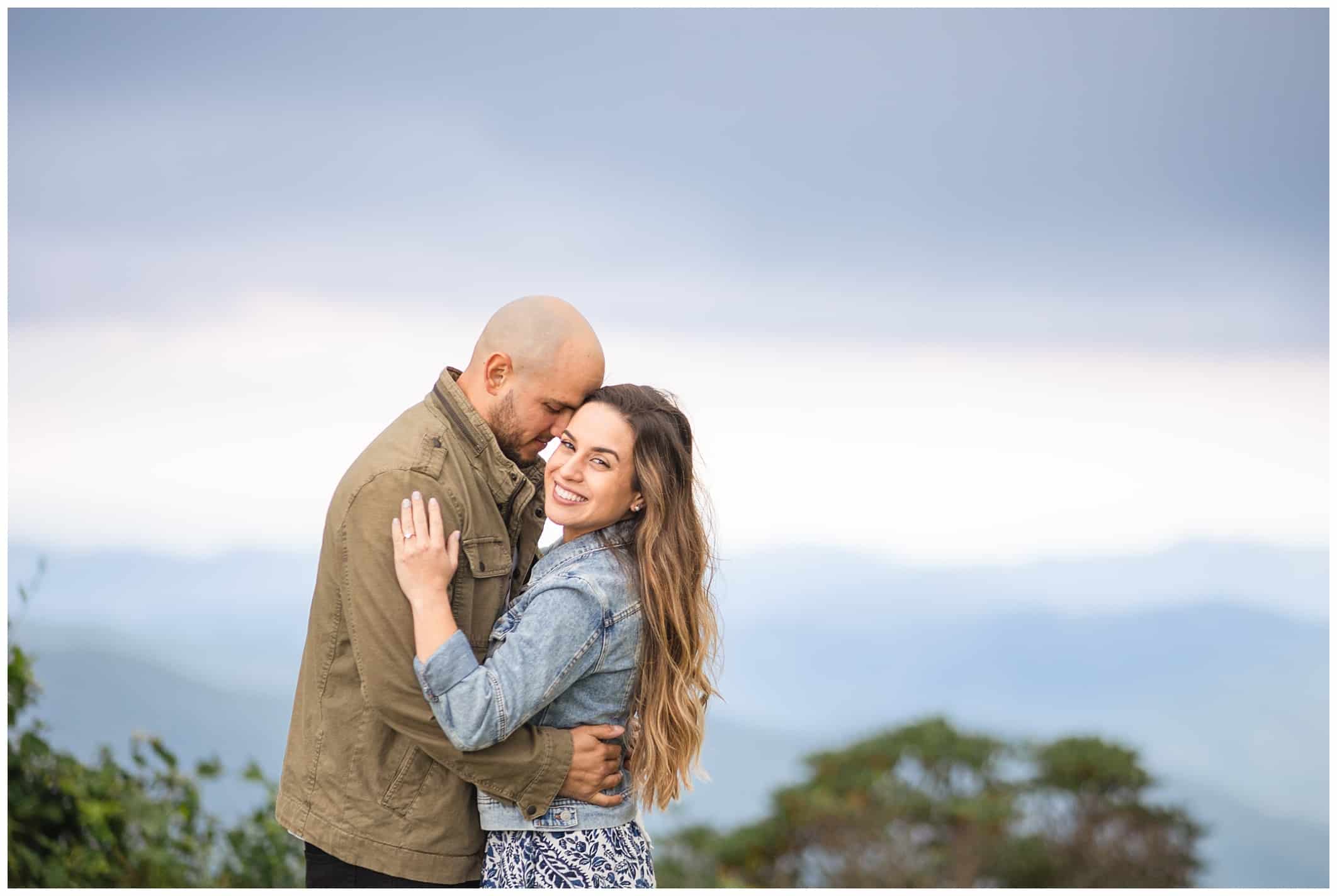 Couple poses for their Blue Ridge Parkway engagement session