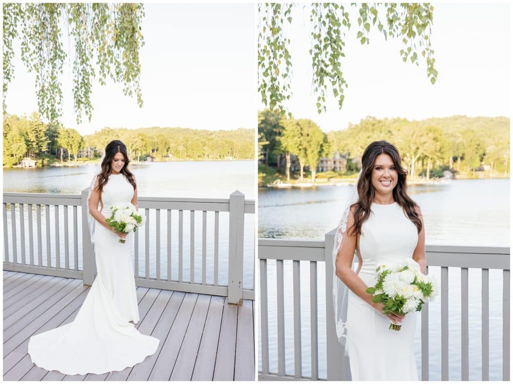 Bride poses with bouquet in front of Lake Toxaway