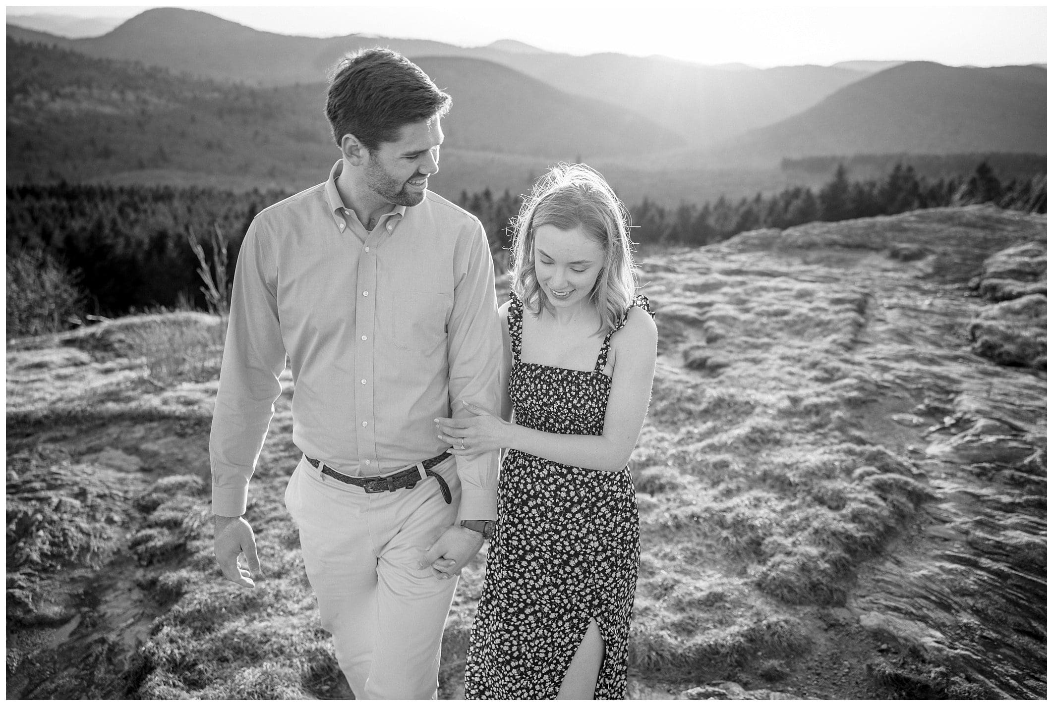 couple poses in black and white for their Black Balsam engagement photos