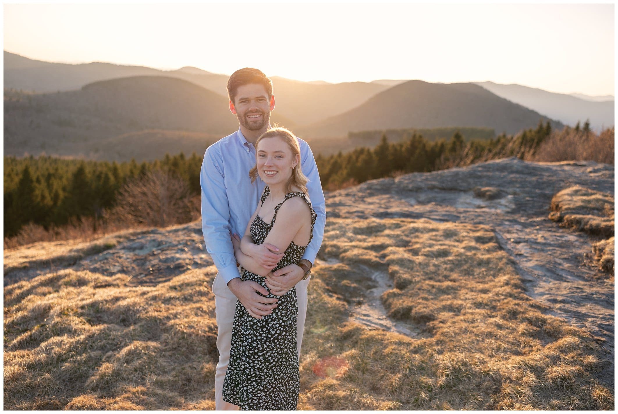 Engagement photo of couple with mountain views