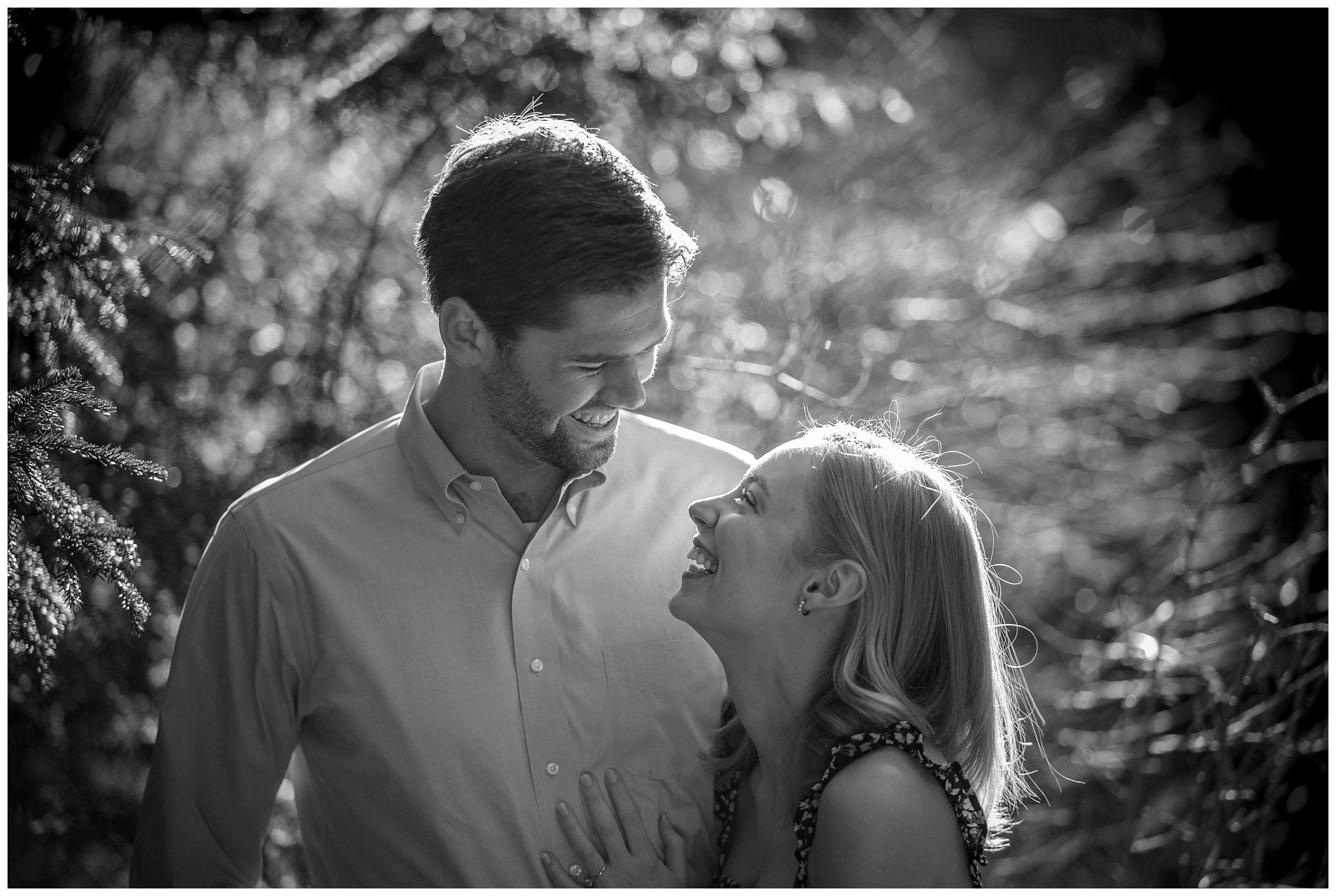 black and white photo of couple posing for their engagement session