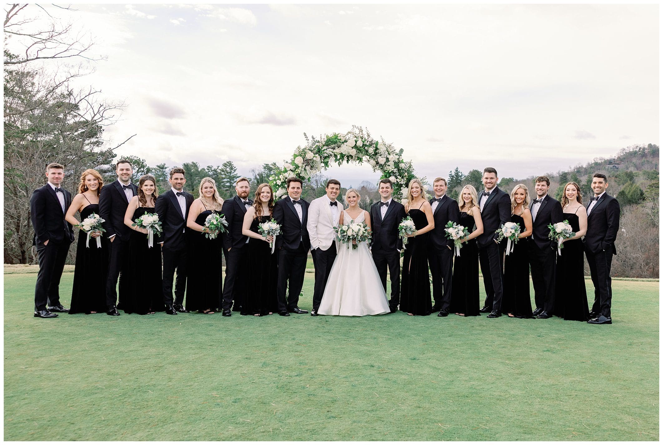 group photo of bridal party outdoors at Asheville Country Club