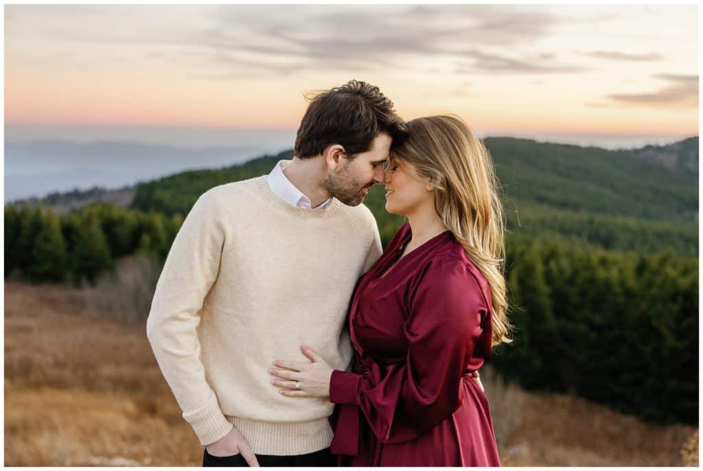 couple shares intimate moment for their Blue Ridge Mountain engagement photos