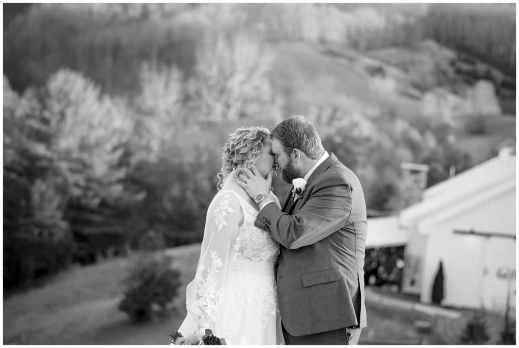 black and white photo of bride and groom in Asheville mountains
