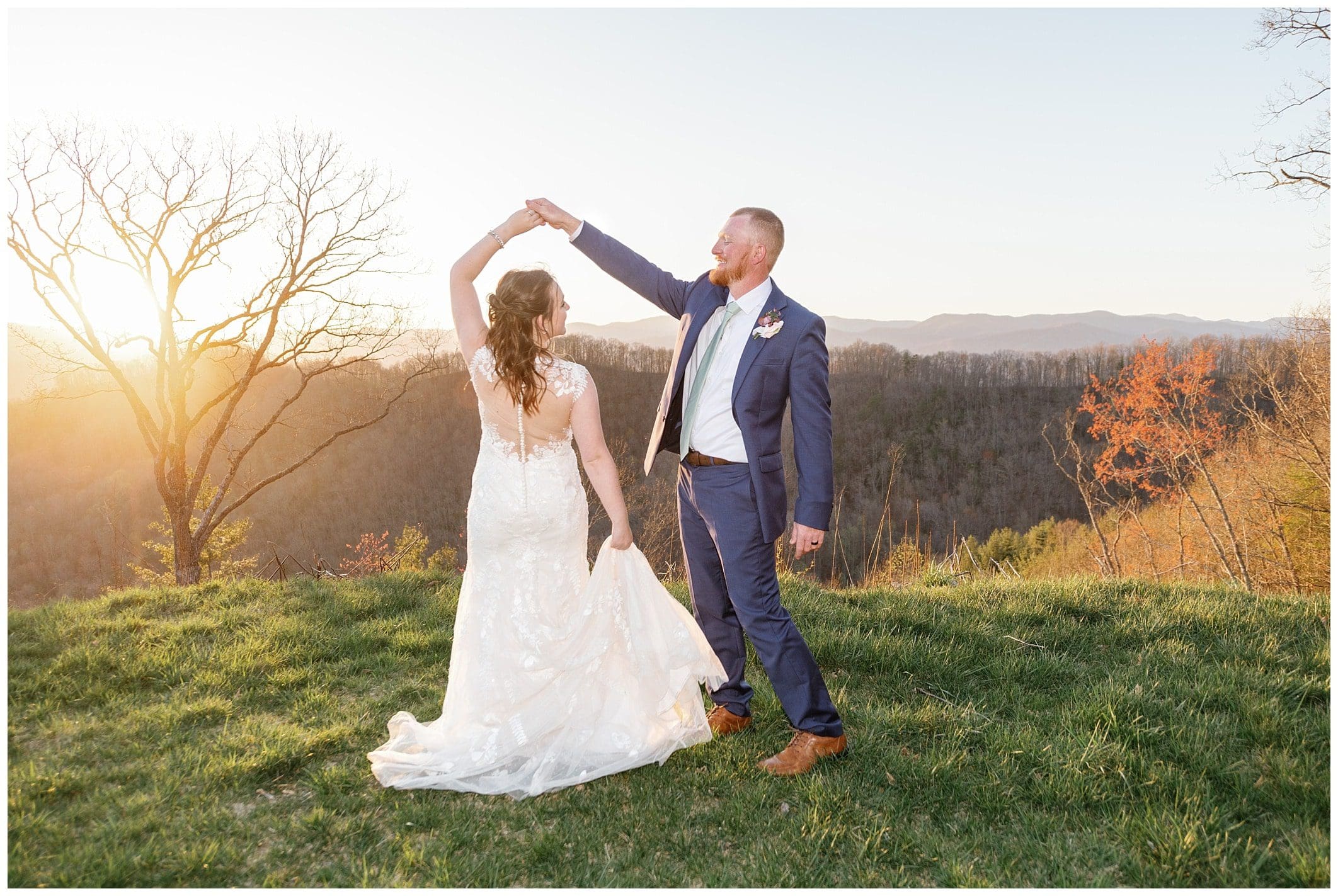 Sunset photos at parker mill venue with golden light while groom spins the bride