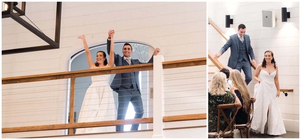 A couple in wedding attire is seen celebrating on a balcony and then walking down stairs into a room with guests.