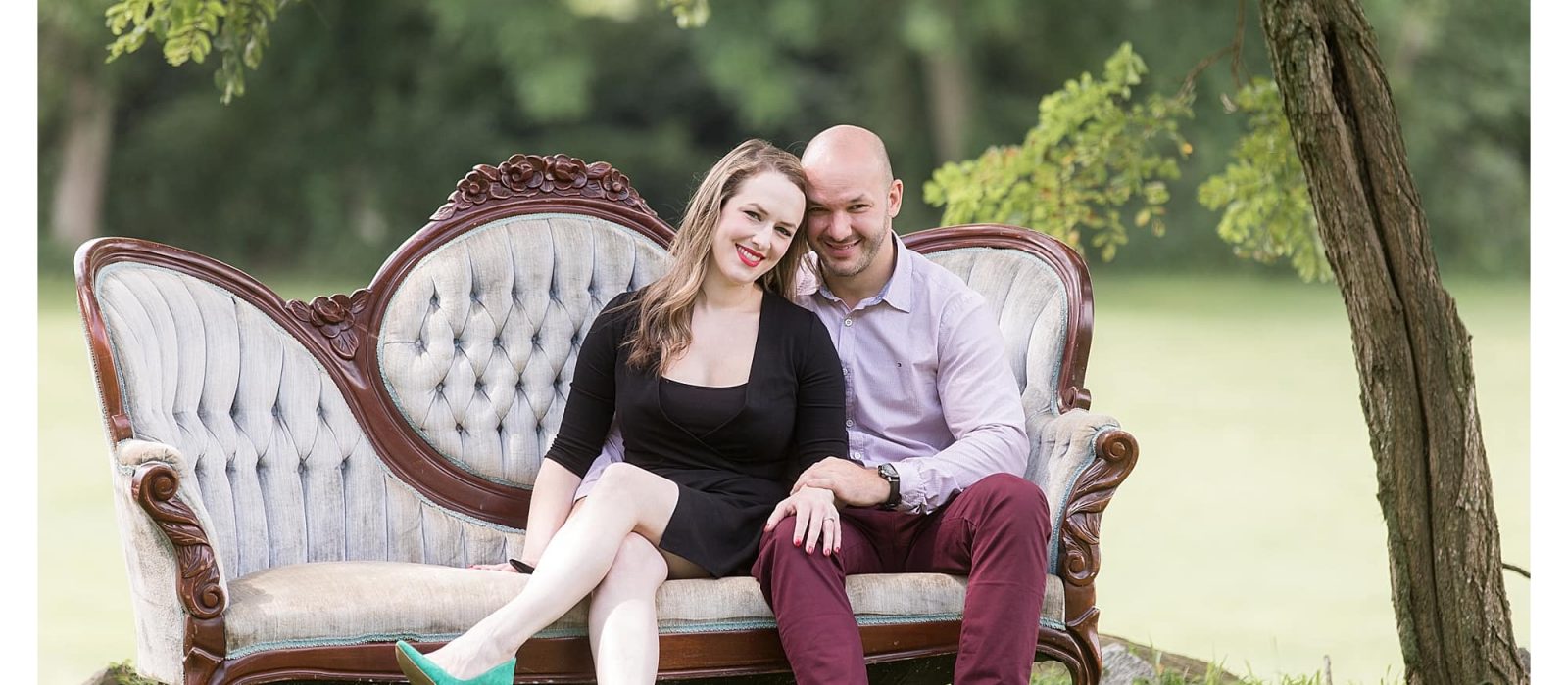 Couple on vintage couch on summer day