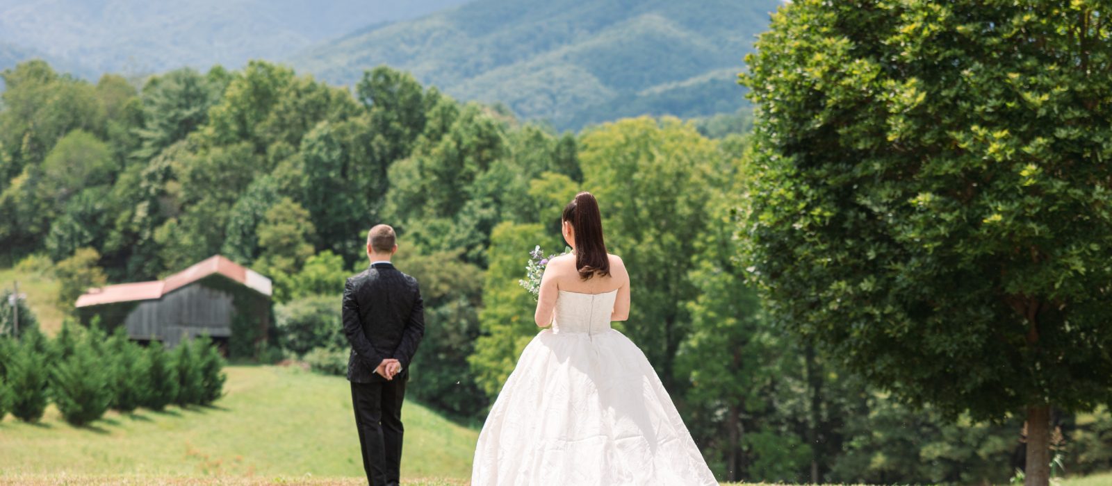 first look at the ridge wedding venue with mountains in the background